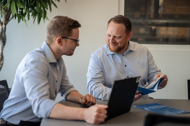 Sintex employees in meeting