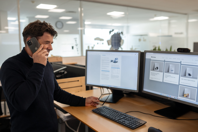 Sintex employee talking on phone